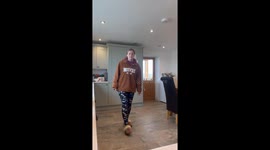 Bold handstand attempt in the kitchen ends with a hilarious fall on stone floor