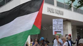 Pro-Palestinian activists protest outside NBC and FOX headquarters in Washington DC (2)
