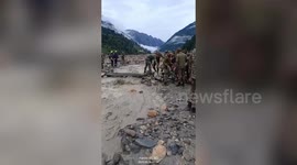 Rescue operation underway to find around 100 missing people after mudslide strikes Indian village