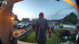Doorbell cam captures moment man falls headfirst into garden hedge