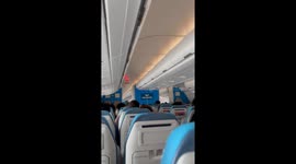 Trembling passenger pray for a safe landing as severe turbulence hits flight