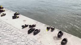 60 pairs of iron shoes on the Danube explained Budapest WWII memorial.