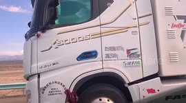Dog spotted tied on top of moving truck in Xinjiang, China