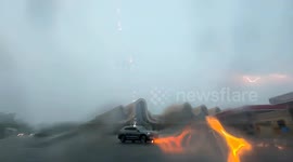 Car struck by lightning THREE times during storm in China, driver unharmed