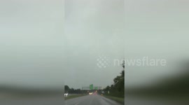 Lightning strikes highway during storm in Indiana