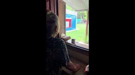 Rooster Romps Across Yard When Called