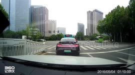 Motorcycle collides with scooter at intersection in Shaanxi, China