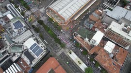 Hundreds rally in Medellin against house arrest of former Colombian President Uribe