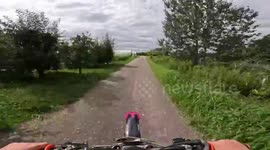 Motorbike crash into woodpile after missed curve in Magnuszew, Poland