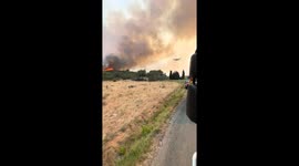Aerial efforts to battle massive wildfire in Albas, France