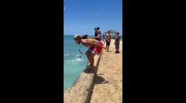 Waikīkī beachgoer’s leap turns into hilarious SAND-SMACK as shore-break outsmarts him