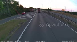 Terrifying moment car wiped out after attempting dangerous overtake of huge truck on UK motorway