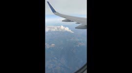 Massive wildfires seen from plane over Colorado mountains