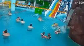 Waterslide visitor into youngster as dad strays from safe area