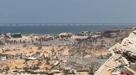 Israeli strikes kill 14 Palestinians, including 3 waiting for aid in Gaza