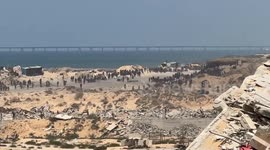 Israeli strikes kill 14 Palestinians, including 3 waiting for aid in Gaza