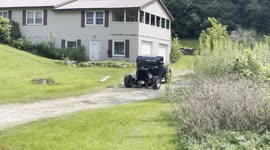 Farm property with Hot Rod in driveway