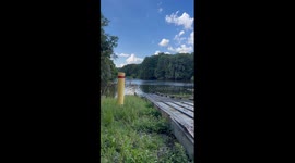 Driving a Mud Boat Over a Dam