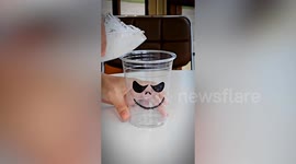 Cafe serves cold milk with ghost marshmallows