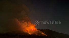 Wildfire in Italy's Vesuvius National Park sends towering smoke skyward