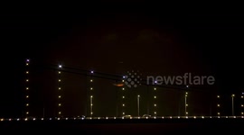 Full moon lights up Istanbul's 15 July Martyrs Bridge, Suleymaniye Mosque