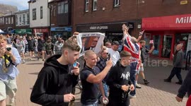 Anti-immigration protesters march through Nuneaton town centre