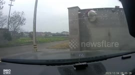 Dashcam captures collision and roadside crash in Zhejiang, China