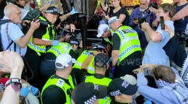 Elderly Quaker Carried Away and Arrested by Police at Protest in Support of Recently Proscribed Group Palestine Action. Parliament Square, London, UK 09/08/2025