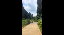 Woman loses control causing sidecar motorcycle crash in Guangxi, China
