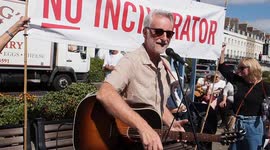 Left wing Musician Billy Bragg Attends Protest and March to stop the Portland Incinerator being built near to his home on the Jurassic Coast in Dorset.