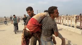 Palestinians in Gaza flock to aid distribution point near Netzarim Corridor (2)