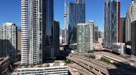 Aerial Majesty: Toronto’s Skyline and Lake Ontario Dazzle on a Perfect Summer Day
