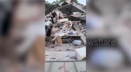 MOMENT - Quake victim rescued from rubble after 6.1 magnitude earthquake in Türkiye’s Balikesir