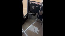 Floodwater seeps into bus as it battles through deluge in Japan