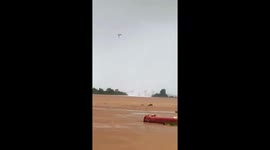 Waterspout tornado sweeps through riverside homes in Vietnam