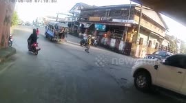 Toddler opens car door and falls onto road at busy junction