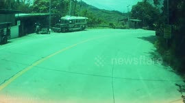 Driver leaps from cement mixer as brakes fail and it crashes over mountainside