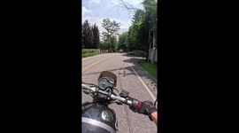 Beginner motorcyclist confronts sanitation truck driver in Long Island, New York