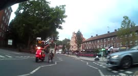 Motorcyclist tows cyclist 'friend'