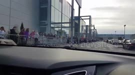 Hundreds of people queue at toy shop for fire damage sale