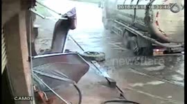 Out-of-control tanker smashes a shop