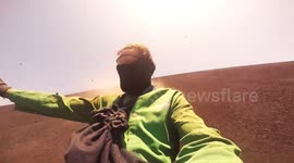 Daredevil surfs down volcano slope in Nicaragua