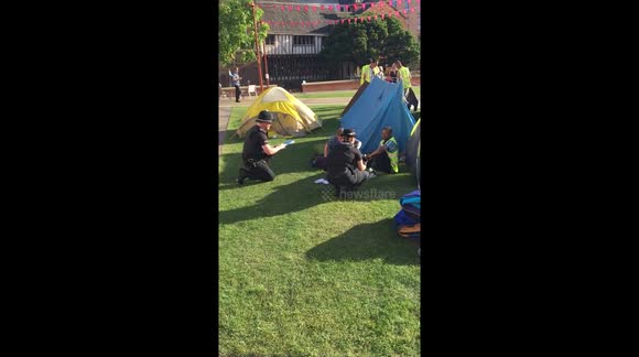 Woman confronts police