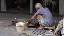 Making tin pots the old fashioned way