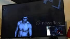 Police arrest a naked robber in southern China