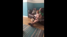 Cute Baby Laughing At Dog Barking