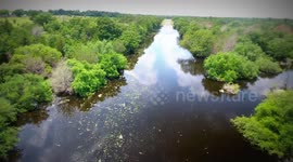 Drone explores a flooded road following storms