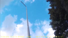 Car smashes into lamp post