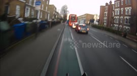 Near Miss! Cyclist almost hit by car turning