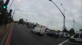 Near Miss! Cyclist almost hit by car turning left